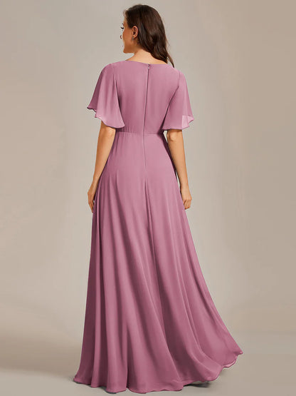 Elegant pleated bridesmaid orhidea dress with V-neckline and floral appliqués
