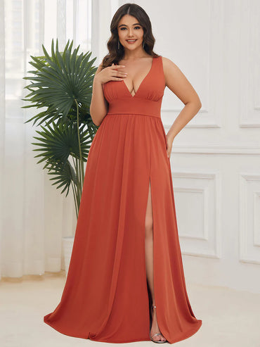 Elegant floor-length evening burnt orange dress with V-neck, empire waist, and high slit