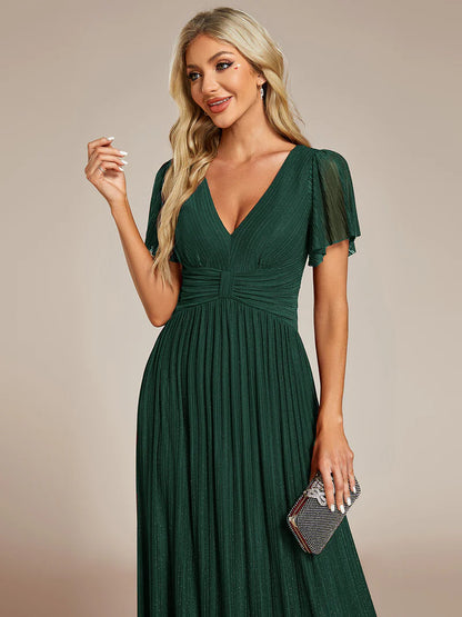 Glittery mesh evening dark green dress with V-neckline and bowknot waist, perfect for elegant parties