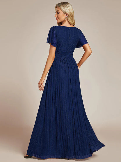 Glittery mesh evening navy blue dress with V-neckline and bowknot waist, perfect for elegant parties