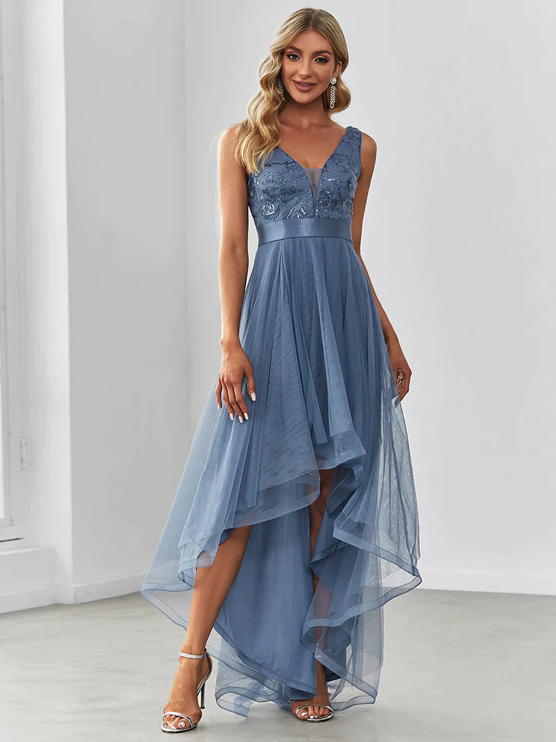 High-low dusty navy tulle prom dress with V-neckline and elegant layered skirt for formal events