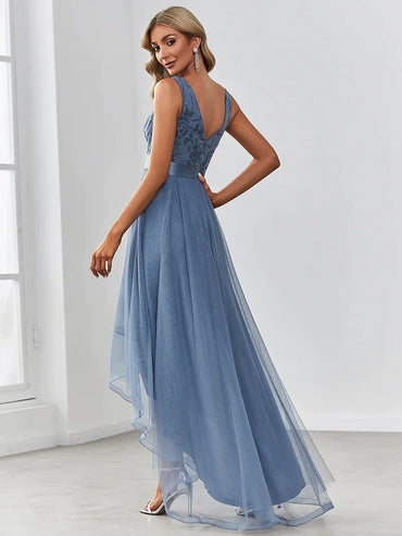 High-low dusty navy tulle prom dress with V-neckline and elegant layered skirt for formal events