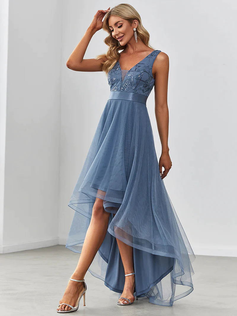 High-low dusty navy tulle prom dress with V-neckline and elegant layered skirt for formal events