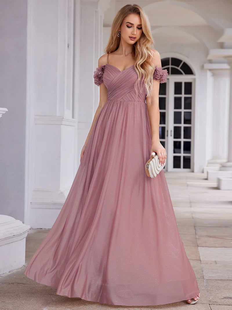 Glamorous sequin gown featuring off-the-shoulder sleeves, sweetheart bodice, and floral accents orhid dress