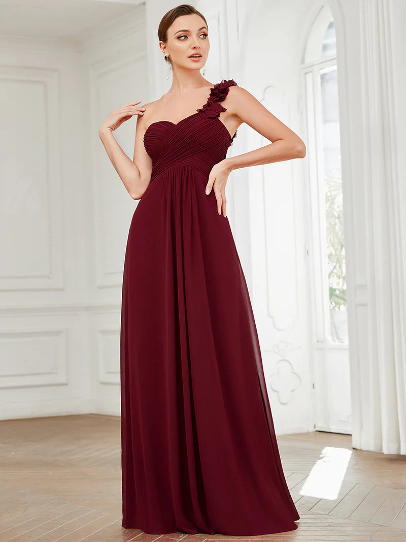 Elegant one-shoulder chiffon burgundy bridesmaid dress with floor-length maxi silhouette