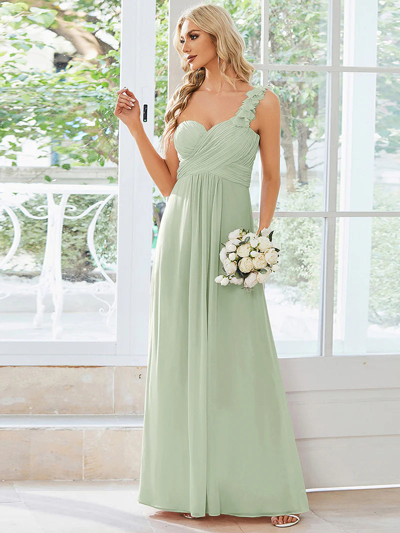 Elegant one-shoulder chiffon mint green bridesmaid dress with floor-length maxi silhouette
