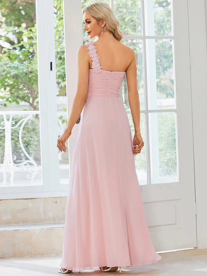 Elegant one-shoulder chiffon pink bridesmaid dress with floor-length maxi silhouette