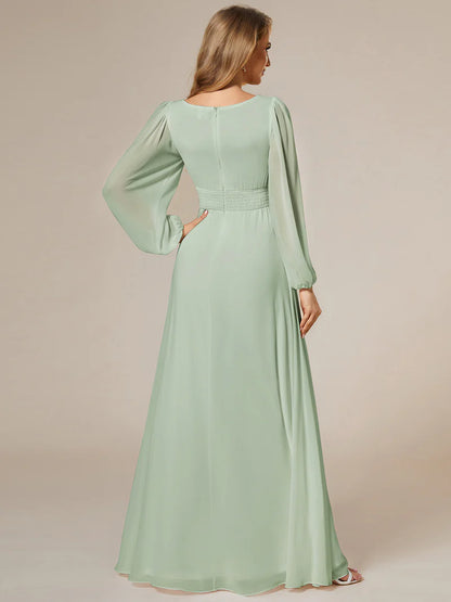 Mint green bridesmaid dress with round neckline and long lantern sleeves