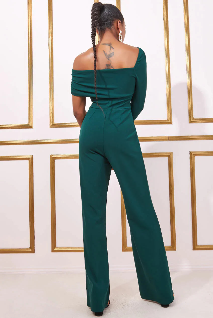 One-shoulder emerald green scuba jumpsuit, sleek and modern evening wear for special occasions