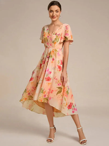 Peach fuzz elegant chiffon wedding guest dress with pleated bodice and ruffle detailing
