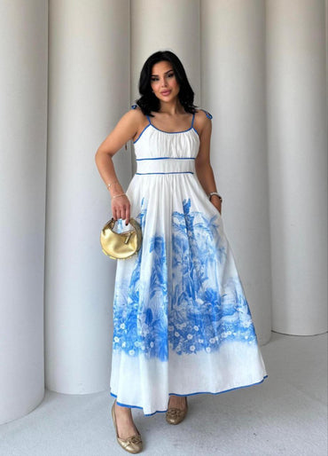Blue cotton midi dress with palm leaf print, perfect for summer picnics