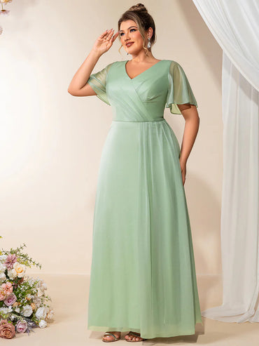 Plus size mint green evening dress with ruffle V-neckline, A-line silhouette, and short sleeves