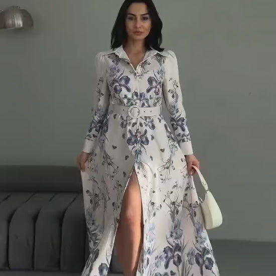Vintage-inspired floral maxi dress with long sleeves and belted waist