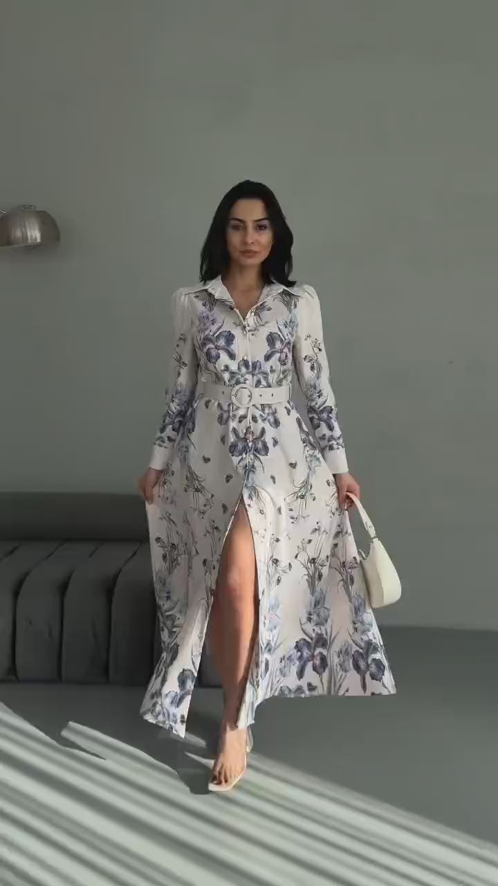 Vintage-inspired floral maxi dress with long sleeves and belted waist