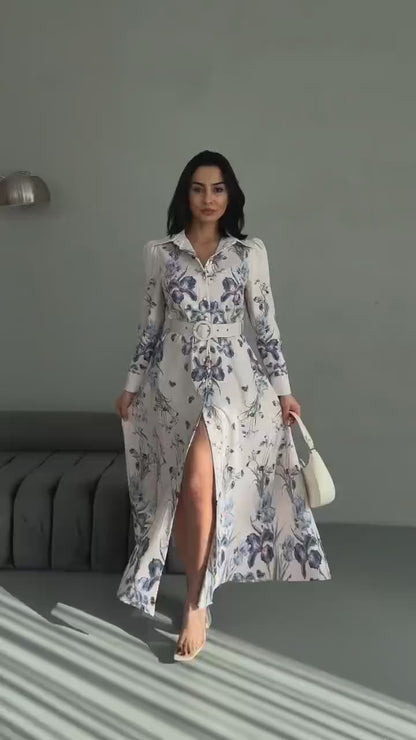 Vintage-inspired floral maxi dress with long sleeves and belted waist