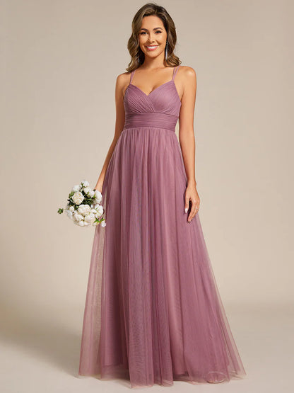 Romantic purple orchid bridesmaid dress with spaghetti straps, lace halter neckline, and open back
