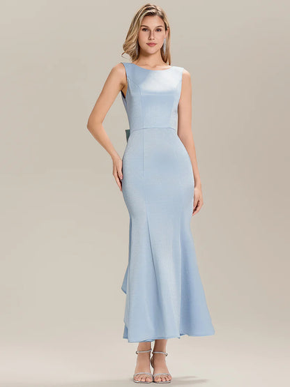 Floor-length light blue mermaid gown in satin with sleeveless bodice and dramatic ruffle
