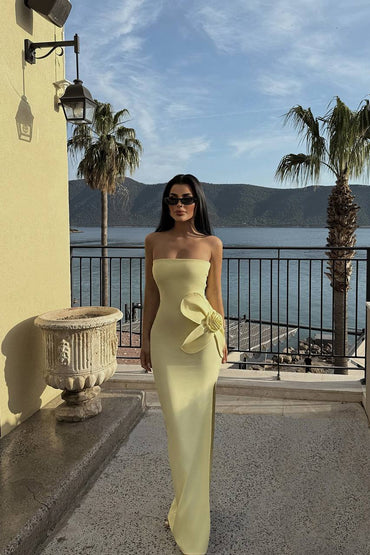 Strapless yellow maxi dress with 3D floral detailing and elegant side slit