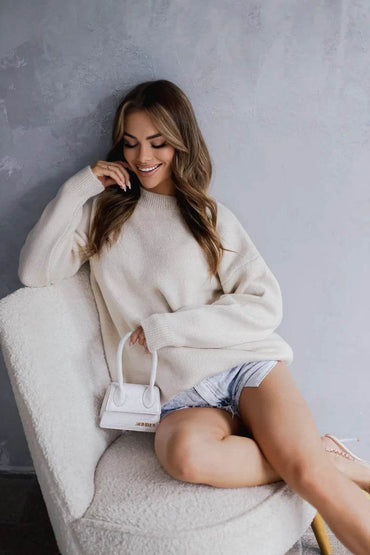 Thick smooth cozy beige sweater, warm and comfortable knitwear for everyday wear