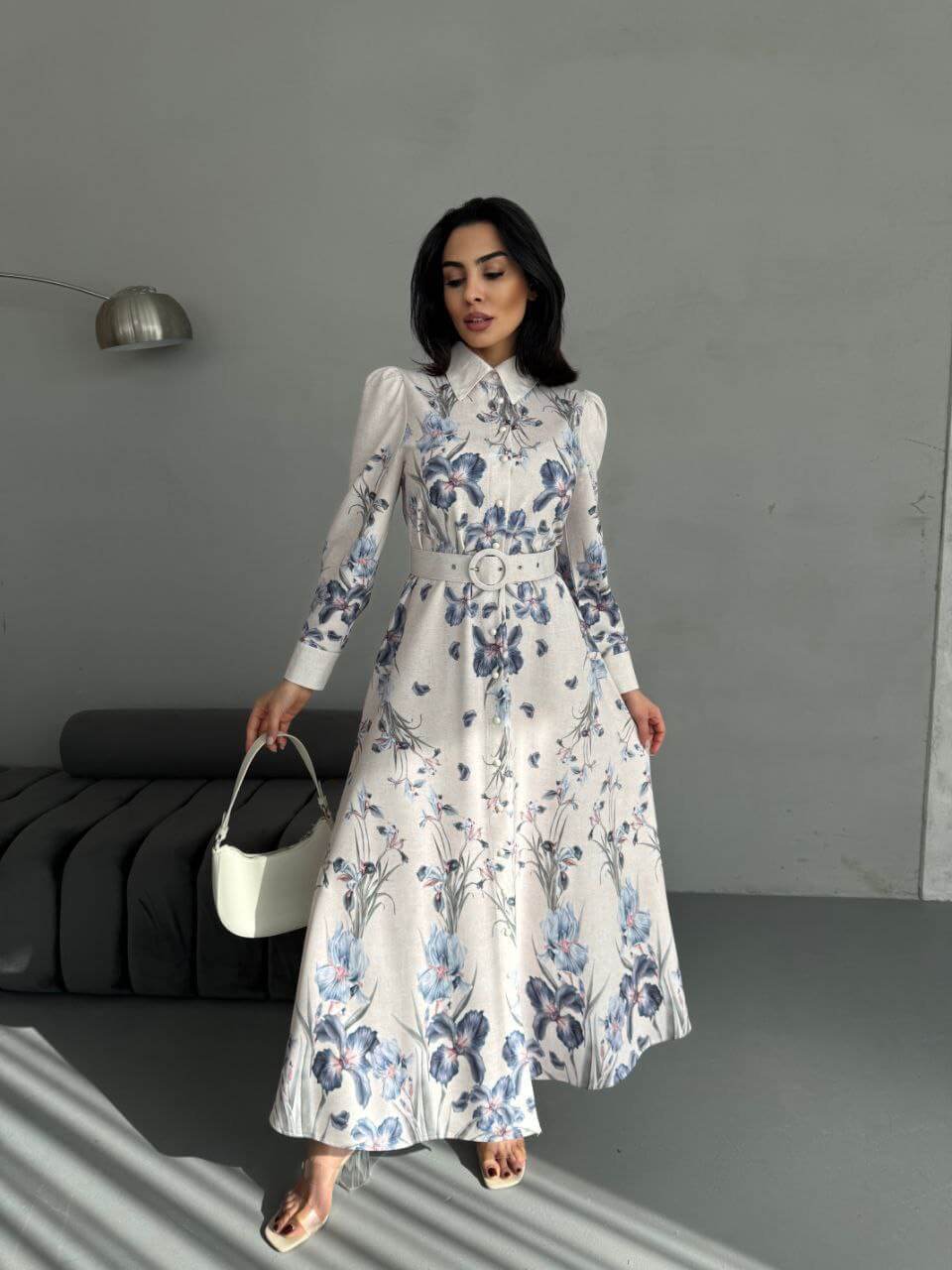 Vintage-inspired floral maxi dress with long sleeves and belted waist