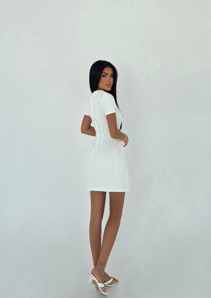 Simple and elegant white mini dress with waist bow details for a casual look