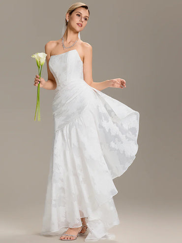 ophisticated white strapless fishtail bridal gown with cold shoulder sleeve design