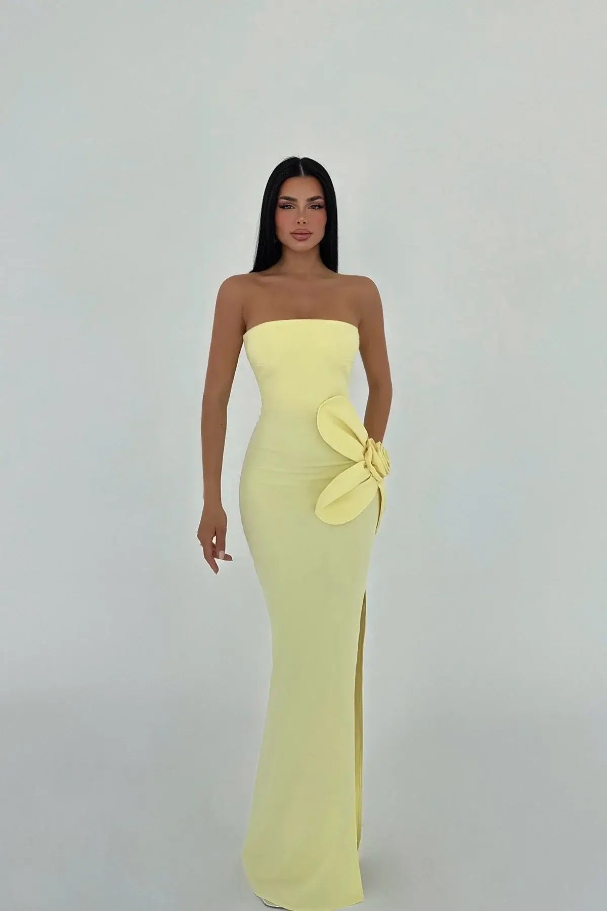 Strapless yellow maxi dress with 3D floral detailing and elegant side slit