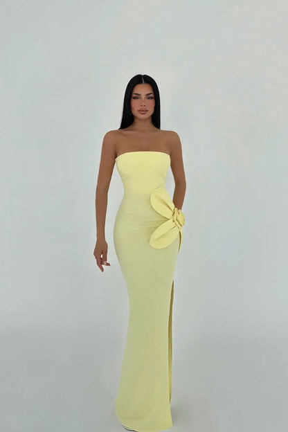 Strapless yellow maxi dress with 3D floral detailing and elegant side slit