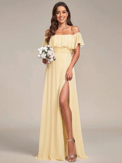 Yellow bridesmaid dress with ruffle detailing and thigh-high split